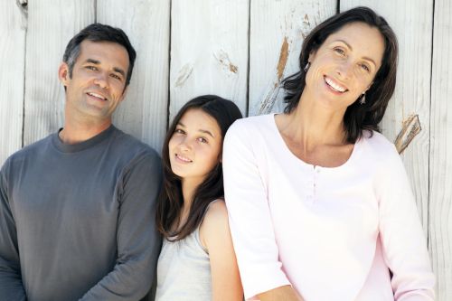 Well adjusted divorced family. Visual concept for a family law blog discussing raising children and co-parenting strategies.