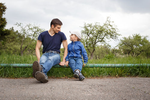 Father talking to young son about divorce - Law Office of Shelly Ingram